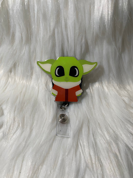 Green alien badge reel